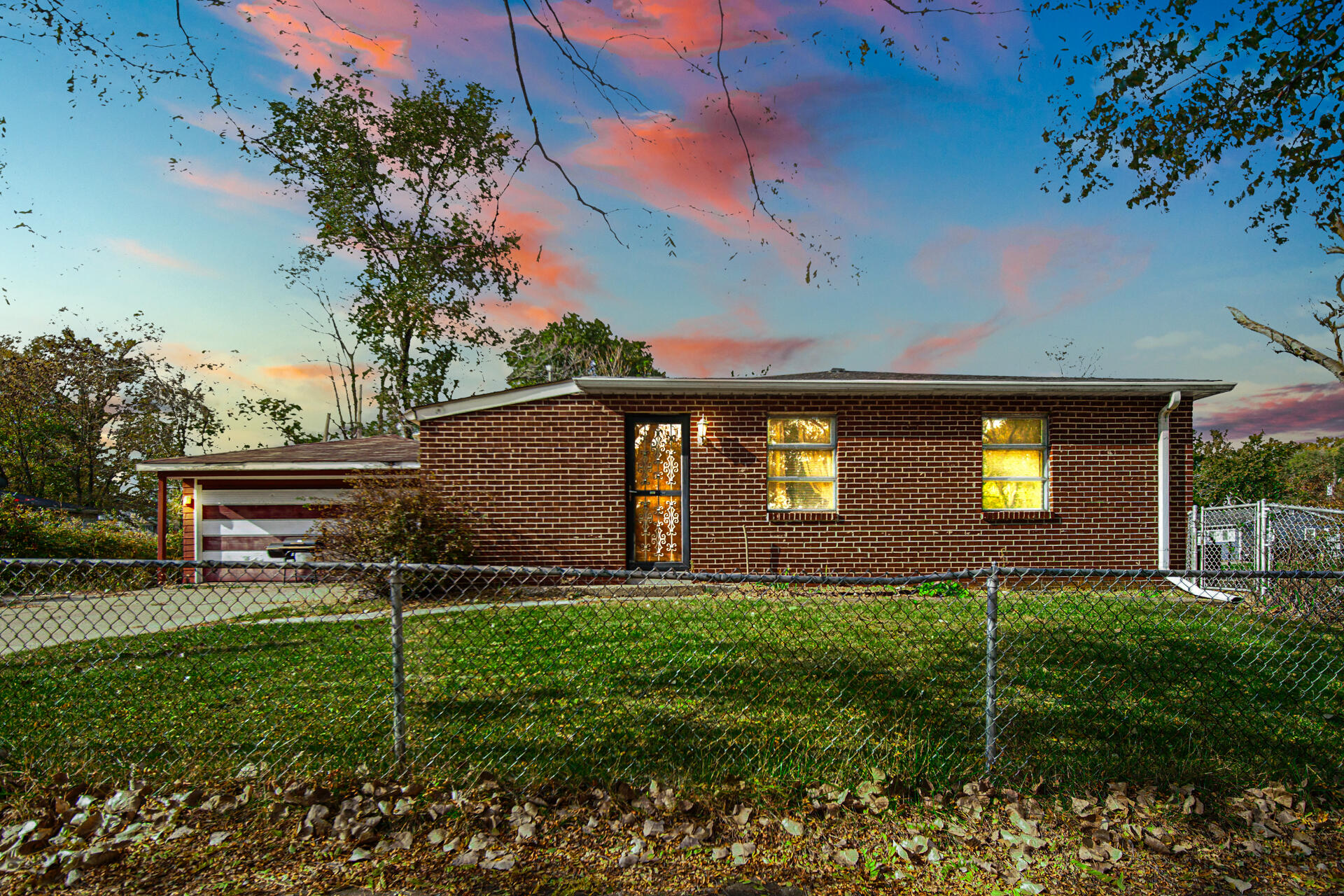 a backyard of a house with lots of green space