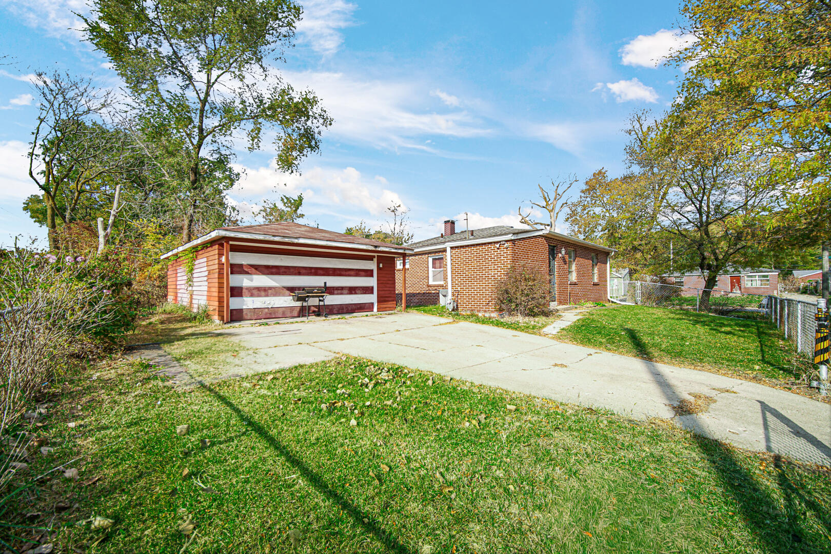 4123 West 19th Place Gary, IN 46404 - Photo 11 of 11 a front view of a house with a yard