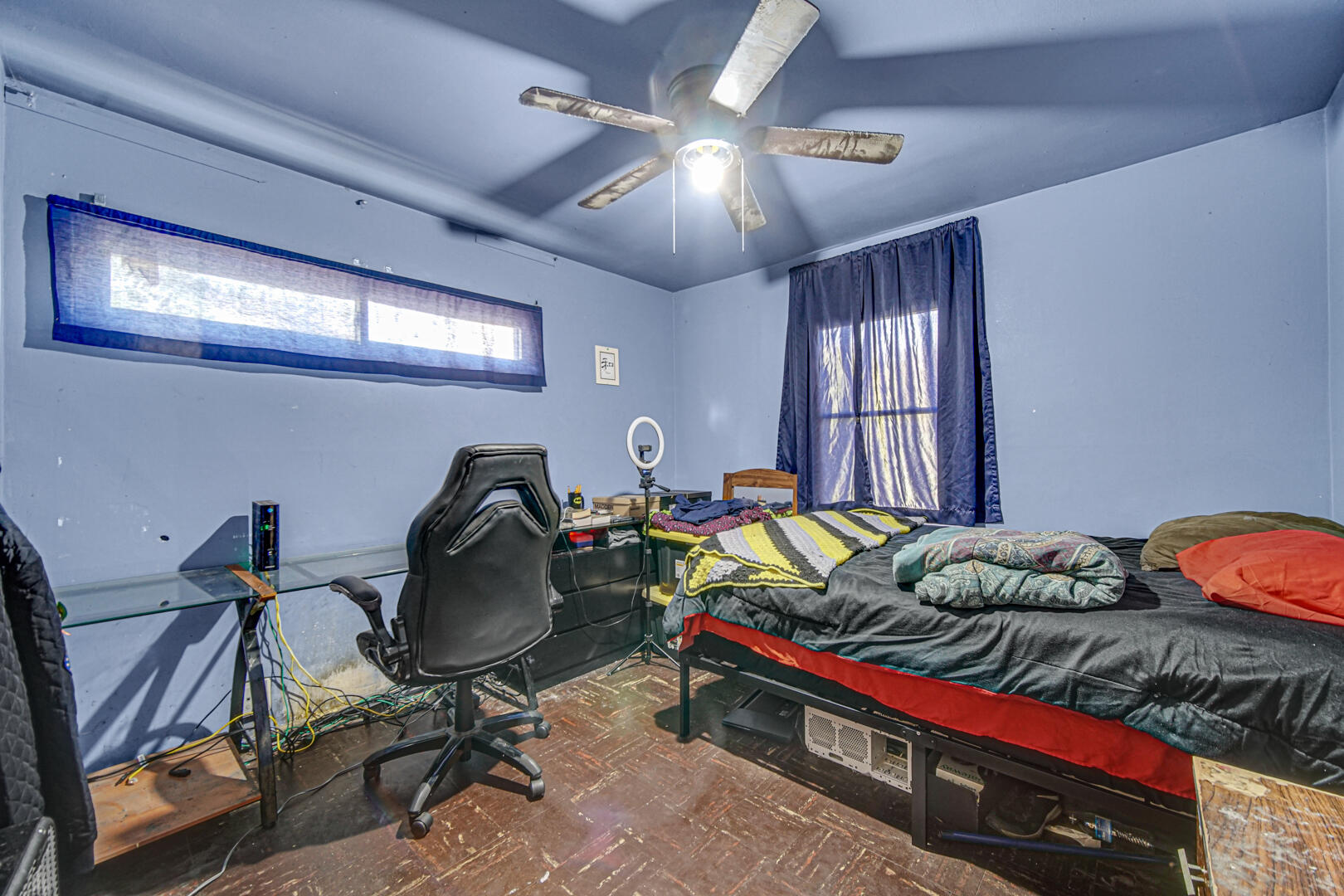 4123 West 19th Place Gary, IN 46404 - Photo 7 of 11 a bed room with a bed and a chair