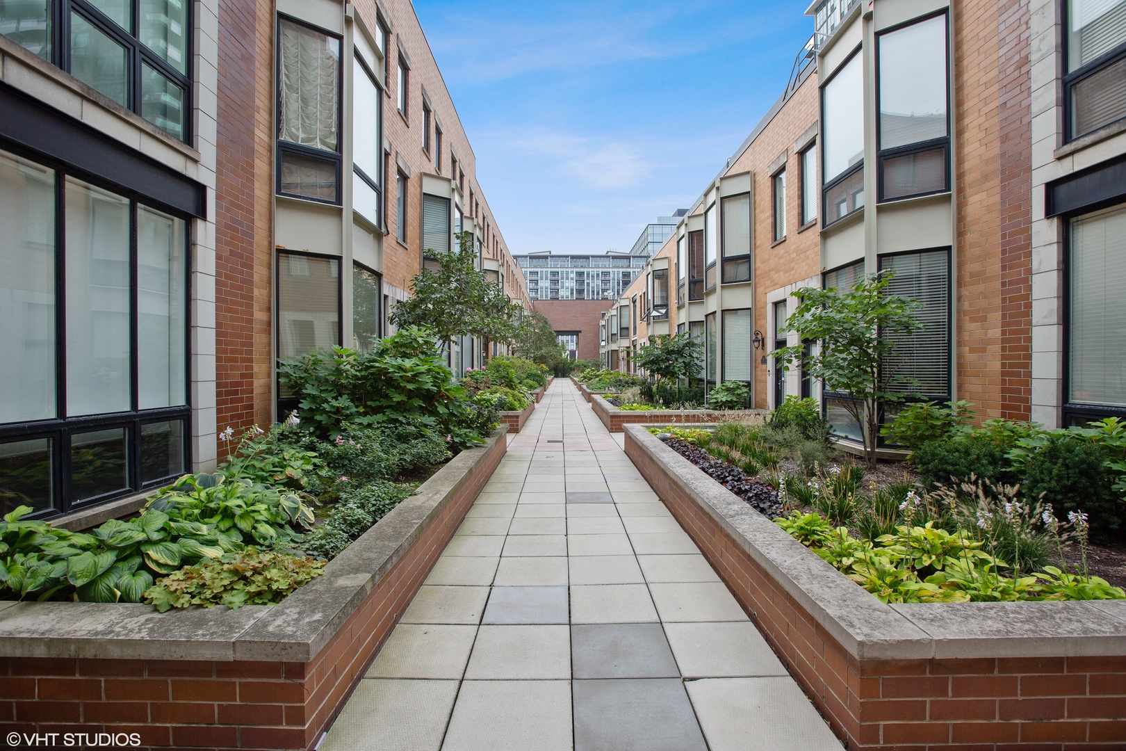 650 West Fulton Street, Unit B Chicago, IL 60661 - Photo 2 of 34 a view of a pathway both side of the house