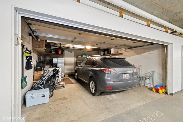 650 West Fulton Street, Unit B Chicago, IL 60661 - Photo 26 of 34 a car parked in garage