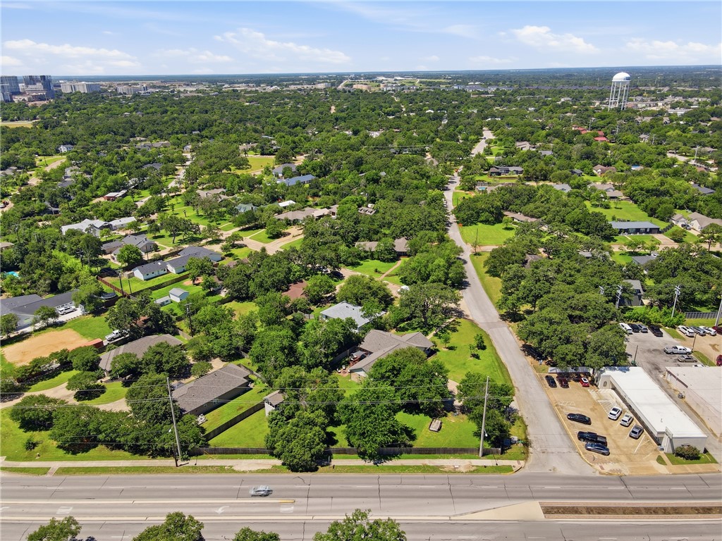 515 Crescent Drive Bryan, TX 77801 - Photo 42 of 43 Aerial perspective showcasing a North Oakwood with extensive tree canopy
