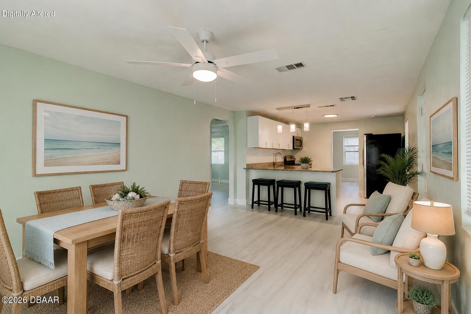 404 Adele Street Edgewater, FL 32132 - Photo 6 of 25 Adele staged dining living area