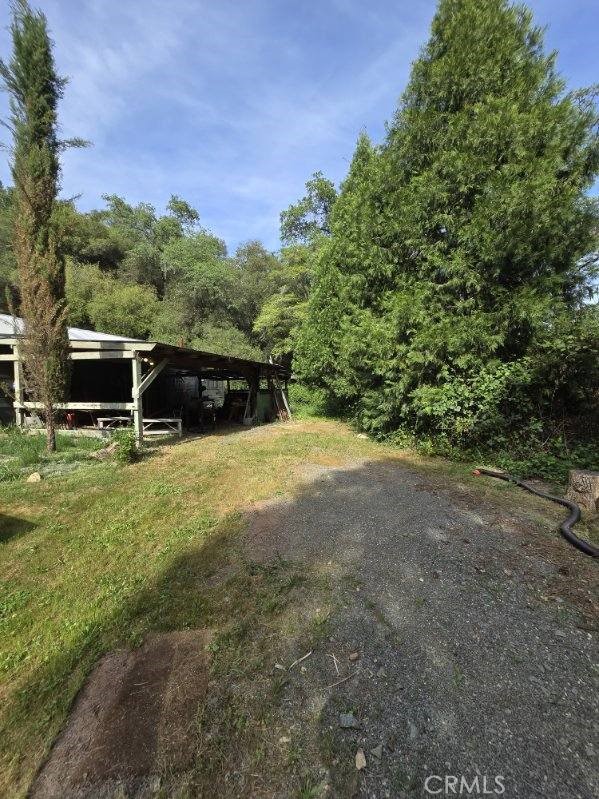 15305 Lake Arthur Road Auburn, CA 95602 - Photo 7 of 11 a view of a house with a yard