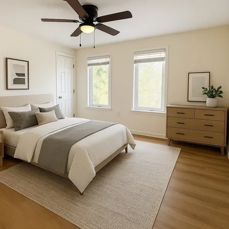 a bedroom with a bed and window