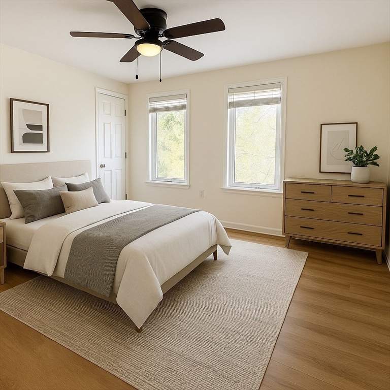 9 Olga Avenue, Unit 9 Worcester, MA 01605 - Photo 13 of 24 a bedroom with a bed and window