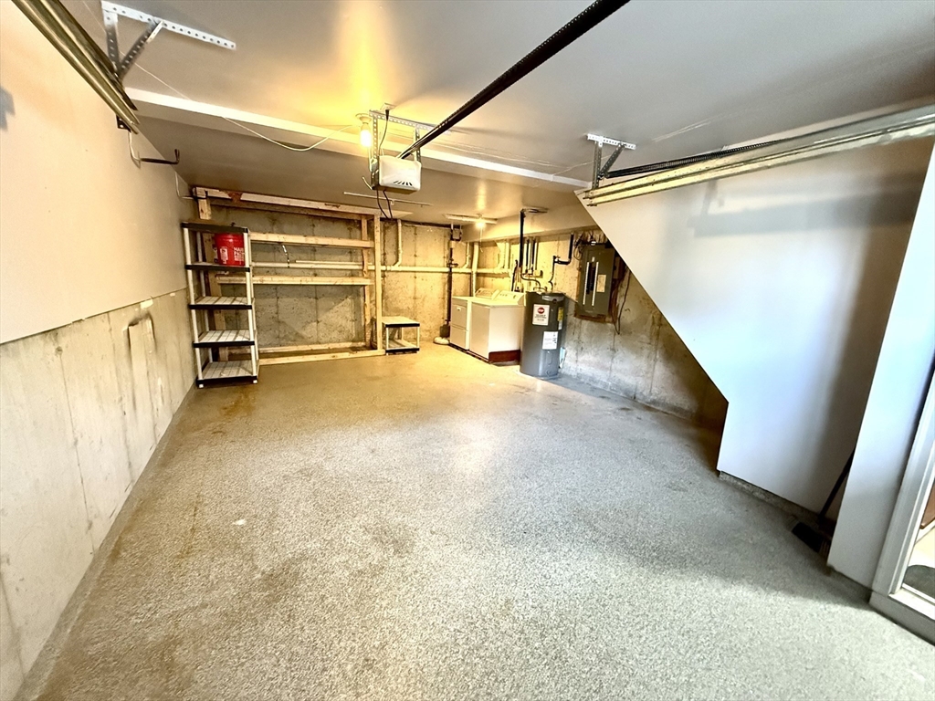 9 Olga Avenue, Unit 9 Worcester, MA 01605 - Photo 18 of 24 a view of a room with wooden floor