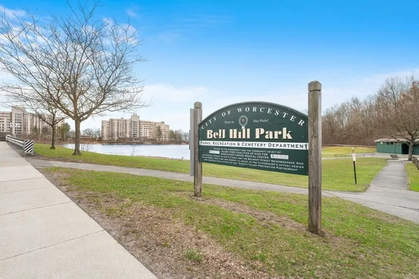 a view of a park with welcome board