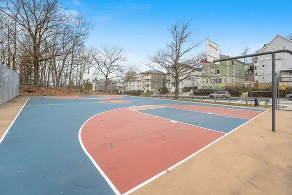 a view of outdoor space and tennis court