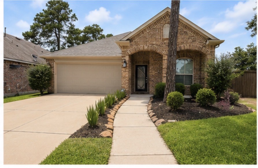 Beautiful brick elevation with inviting curb appeal and manicured landscaping.