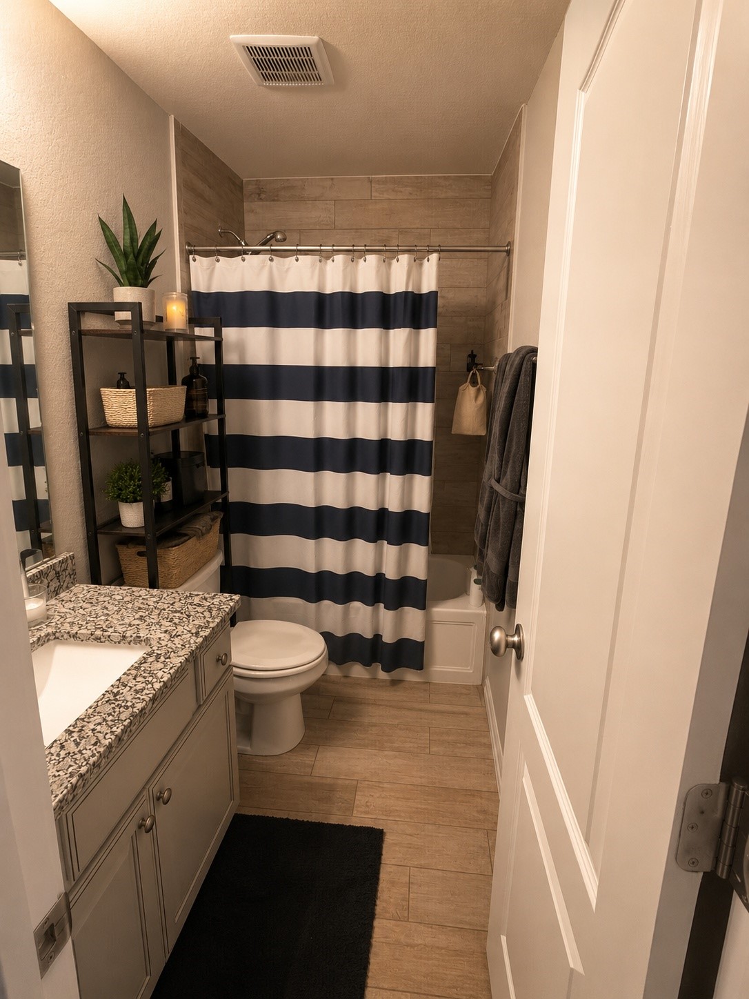 16863 Big Reed Drive Humble, TX 77346 - Photo 11 of 12 Secondary bathroom with modern finishes, granite countertops, and updated fixtures.