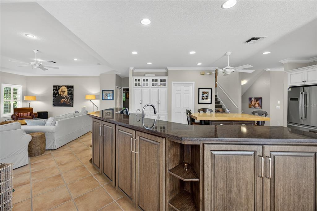 116 Dolly Street Punta Gorda, FL 33950 - Photo 20 of 60 a large kitchen with lots of counter space a sink a window and chairs