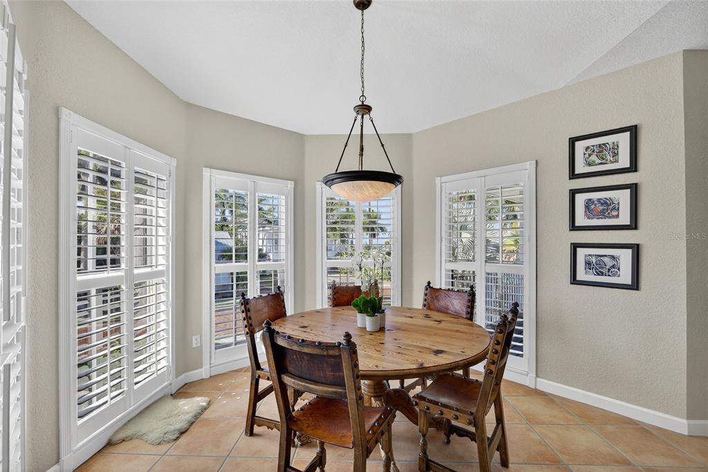 116 Dolly Street Punta Gorda, FL 33950 - Photo 23 of 60 a view of a dining room with furniture window and wooden floor
