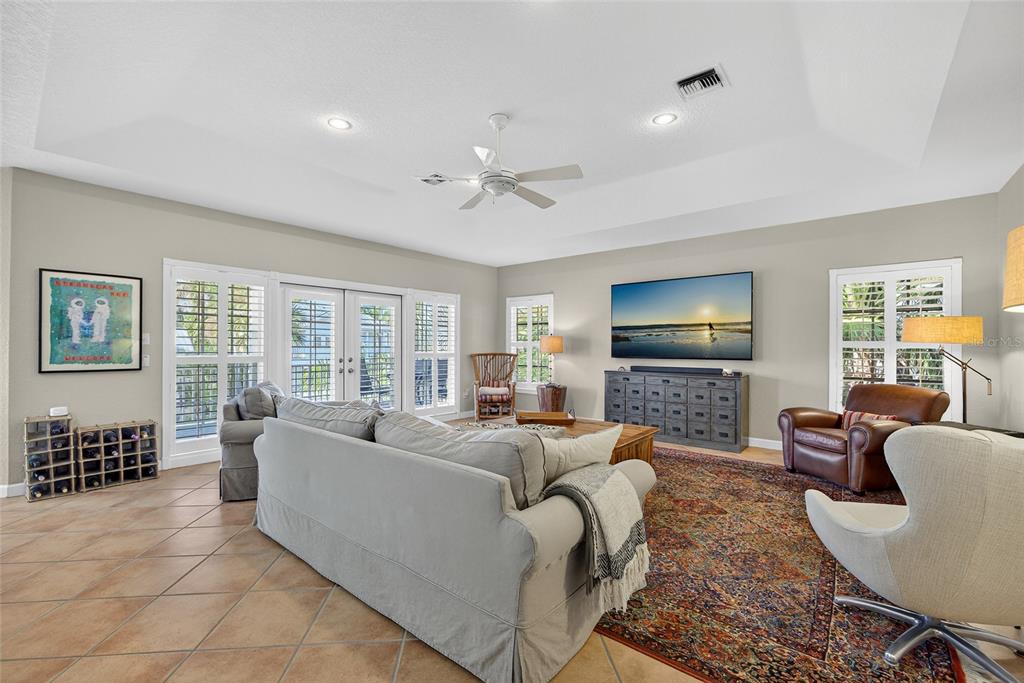 116 Dolly Street Punta Gorda, FL 33950 - Photo 26 of 60 a living room with furniture and a flat screen tv
