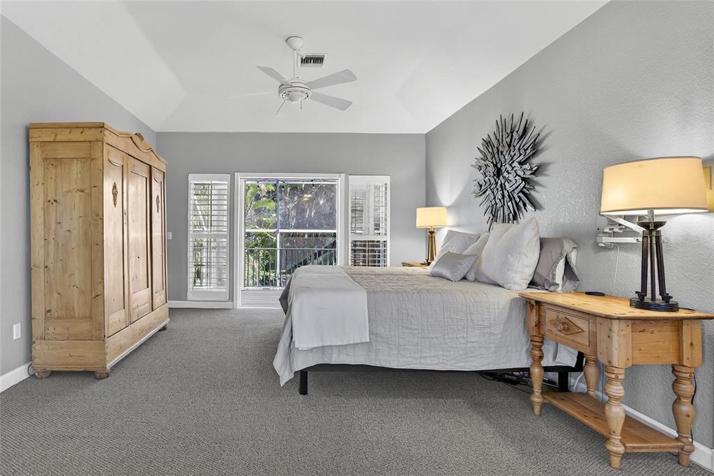 116 Dolly Street Punta Gorda, FL 33950 - Photo 28 of 60 a bed room with a bed and a lamp