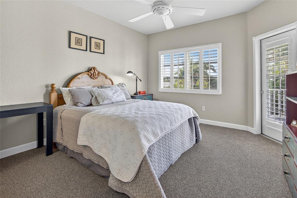 116 Dolly Street Punta Gorda, FL 33950 - Photo 38 of 60 a bedroom with a bed and a window