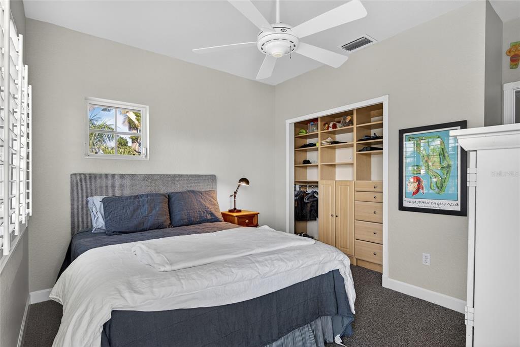 116 Dolly Street Punta Gorda, FL 33950 - Photo 42 of 60 a bedroom with a large bed and a window