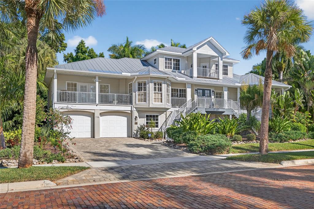 116 Dolly Street Punta Gorda, FL 33950 - Photo 7 of 60 a front view of a house with a garden
