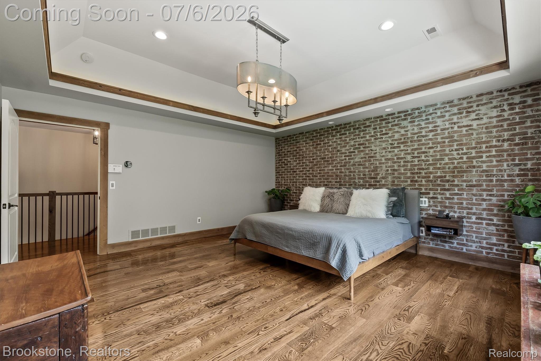 5458 Boulderwood Ridge Clarkston, MI 48348 - Photo 28 of 52 Bedroom 1 Exposed brick with tray ceiling