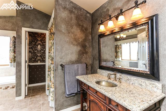 42745 Pearson Ranch Loop Parker, CO 80138 - Photo 17 of 36 Master Bath with Walk-In Shower - Second Floor