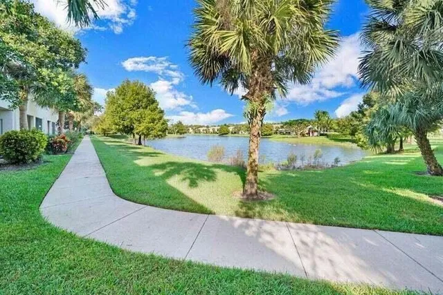 a view of a garden with a lake