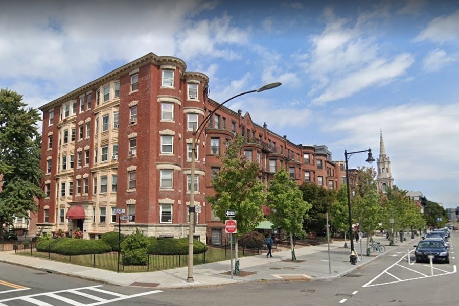 924 Beacon Street, Unit 6 Boston, MA 02215 - Photo 22 of 28 a view of a tall building next to a road