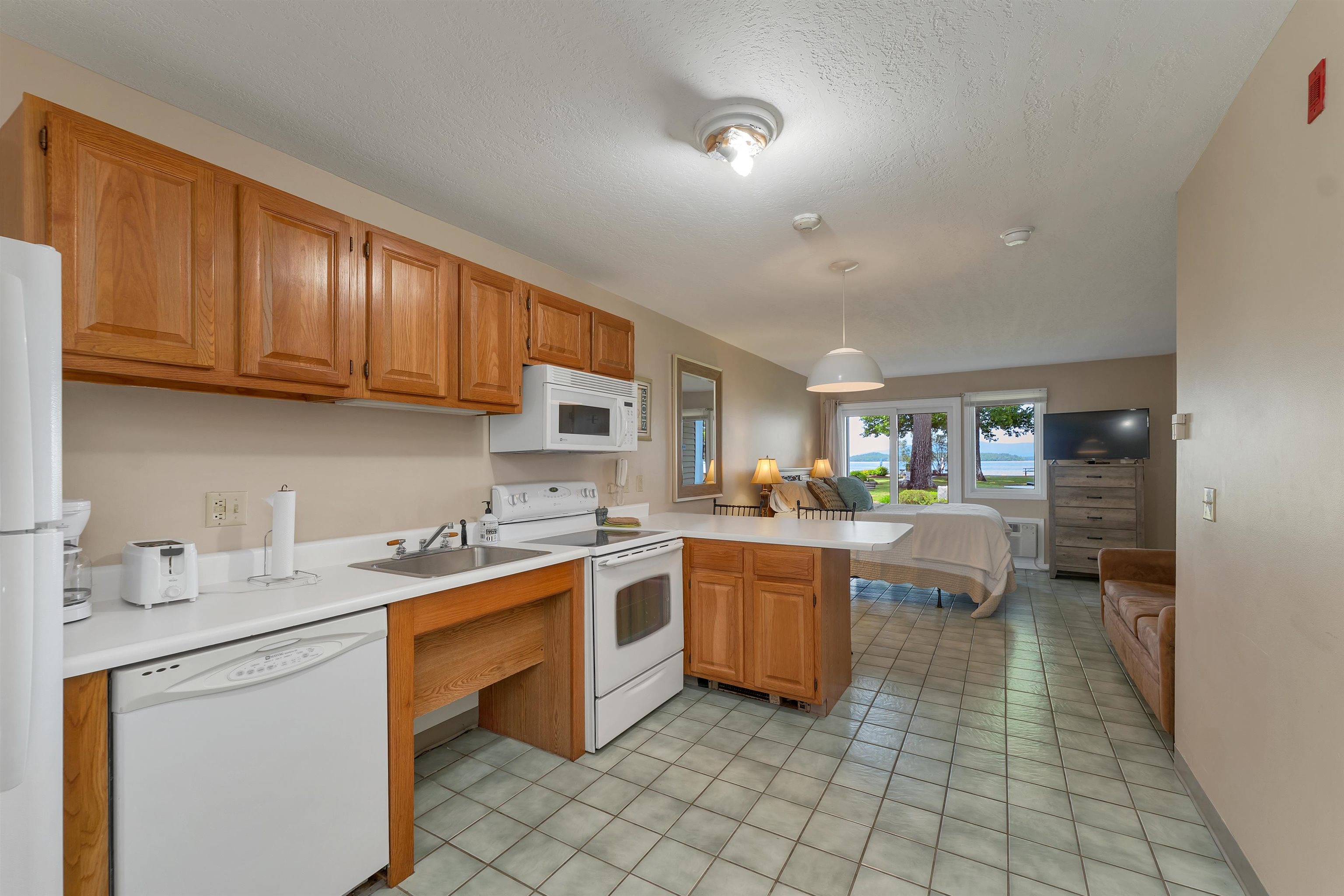 115 Weirs Road, Unit 109B Gilford, NH 03249 - Photo 10 of 38