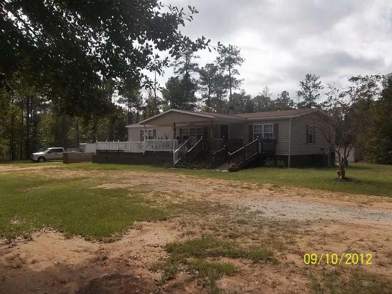 1493 Dixon Road Roberta, GA 31078 - Photo 1 of 1 a view of a house with a yard