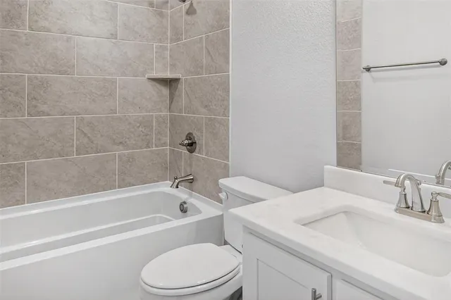 a bathroom with a sink and a bathtub