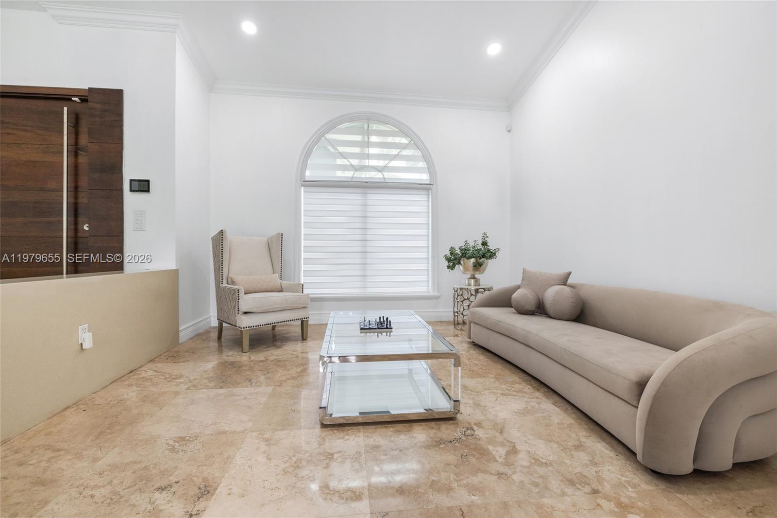 11950 Southwest 43rd Street Miami, FL 33175 - Photo 14 of 78 a living room with furniture and a large window