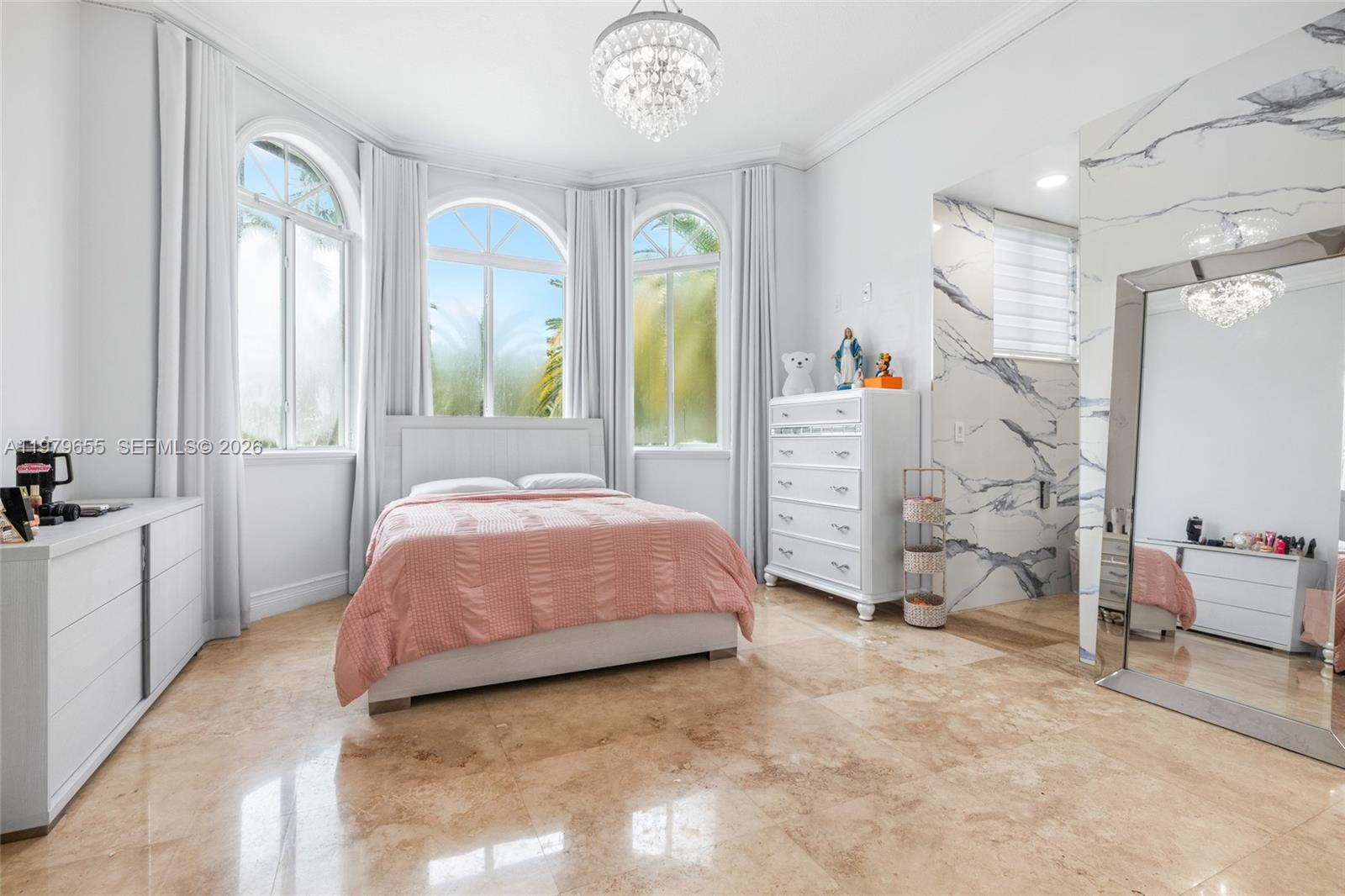 11950 Southwest 43rd Street Miami, FL 33175 - Photo 19 of 78 a spacious bedroom with a bed and a large mirror