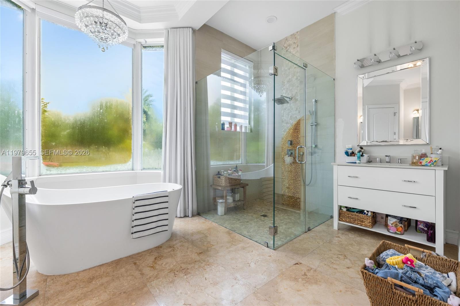 11950 Southwest 43rd Street Miami, FL 33175 - Photo 28 of 78 a bathroom with a tub a sink and a mirror