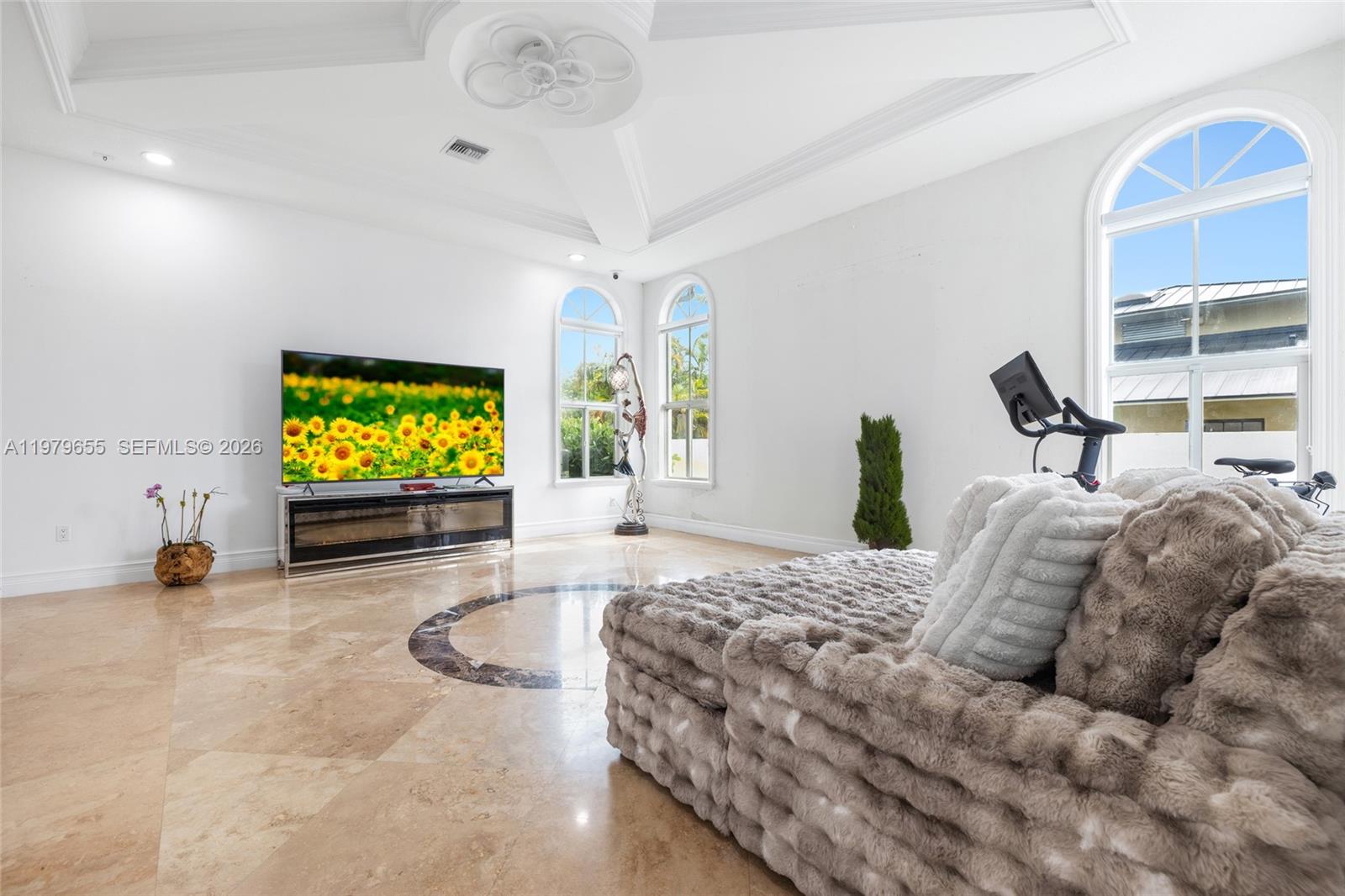 11950 Southwest 43rd Street Miami, FL 33175 - Photo 34 of 78 a bedroom with a bed and a flat screen tv