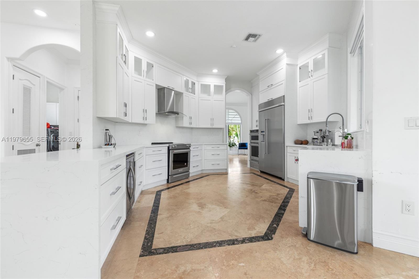 11950 Southwest 43rd Street Miami, FL 33175 - Photo 36 of 78 a kitchen with stainless steel appliances granite countertop a refrigerator sink and cabinets