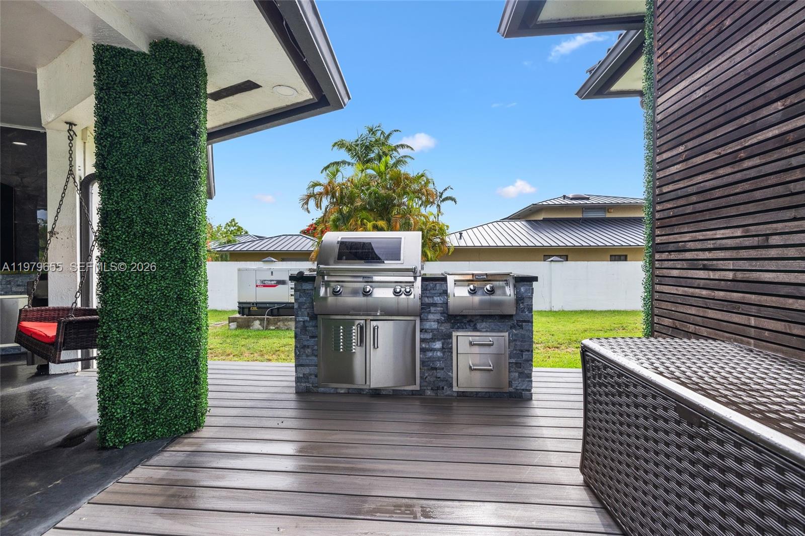 11950 Southwest 43rd Street Miami, FL 33175 - Photo 57 of 78 a view of a swimming pool with seating space