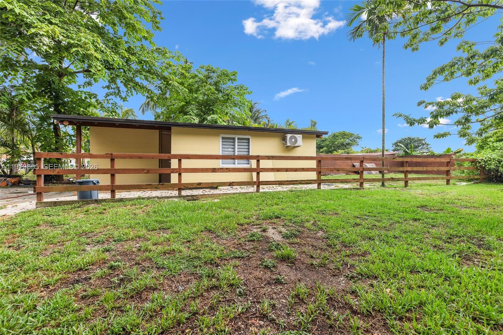 11950 Southwest 43rd Street Miami, FL 33175 - Photo 60 of 78 a view of a bench in a garden