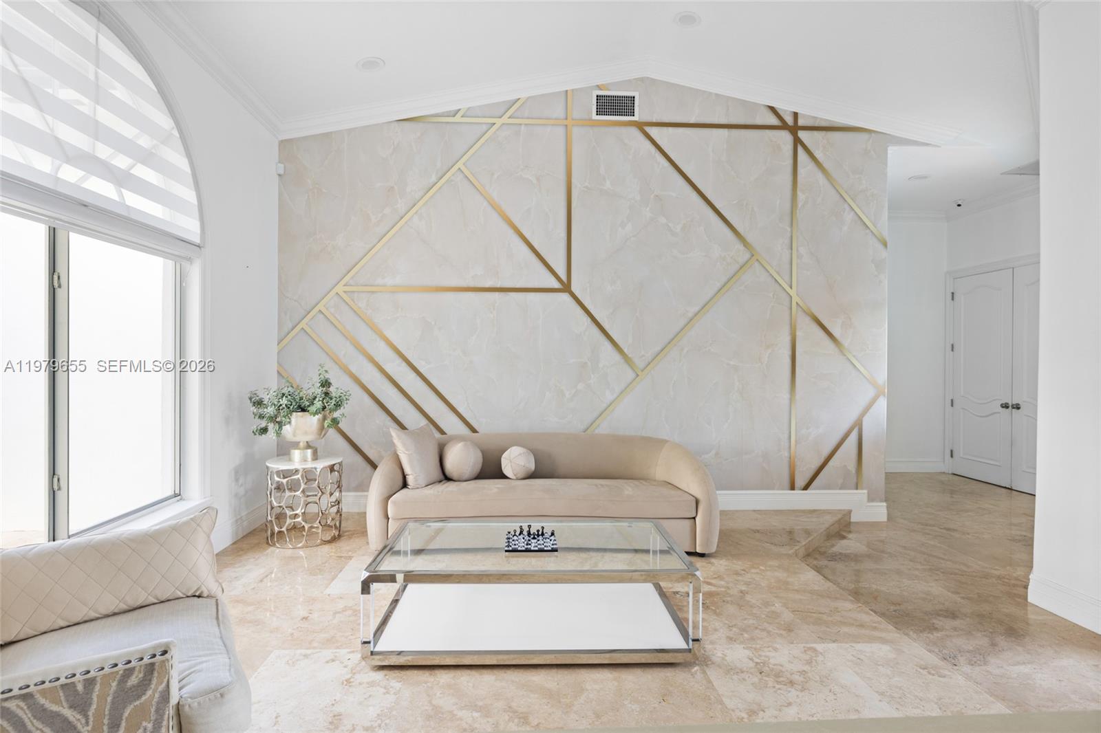 11950 Southwest 43rd Street Miami, FL 33175 - Photo 74 of 78 a living room with a couch and white walls