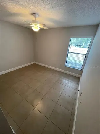 a view of a bathroom with a sink and mirror