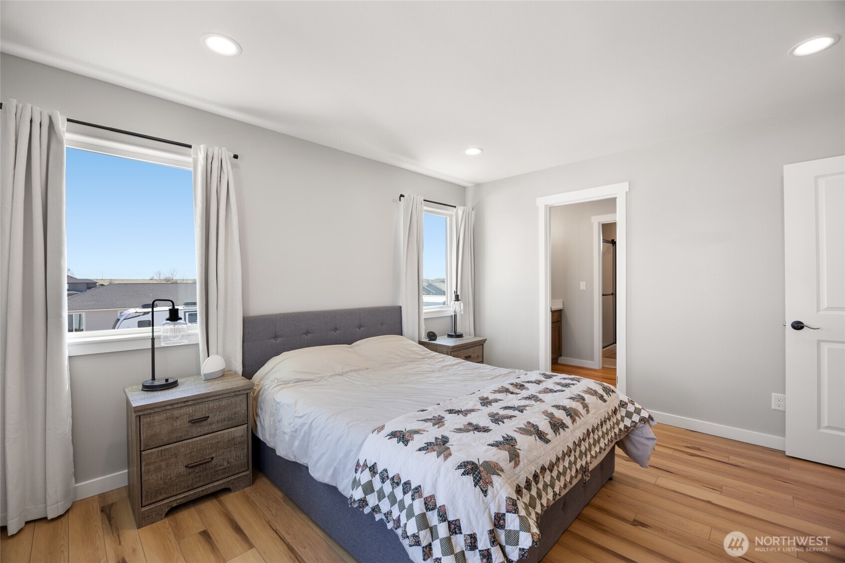 2376 Chelan Street Ephrata, WA 98823 - Photo 19 of 40 a bedroom with a bed and a dresser