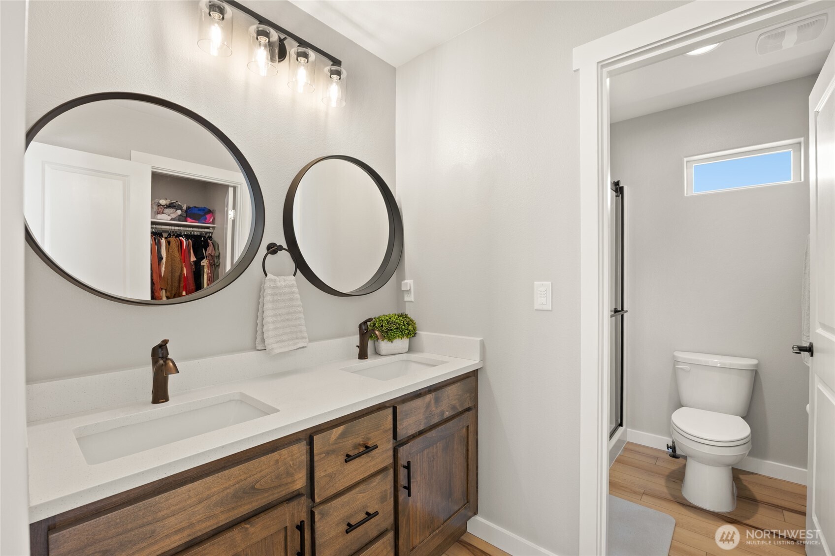 2376 Chelan Street Ephrata, WA 98823 - Photo 20 of 40 a bathroom with a toilet a sink and a mirror