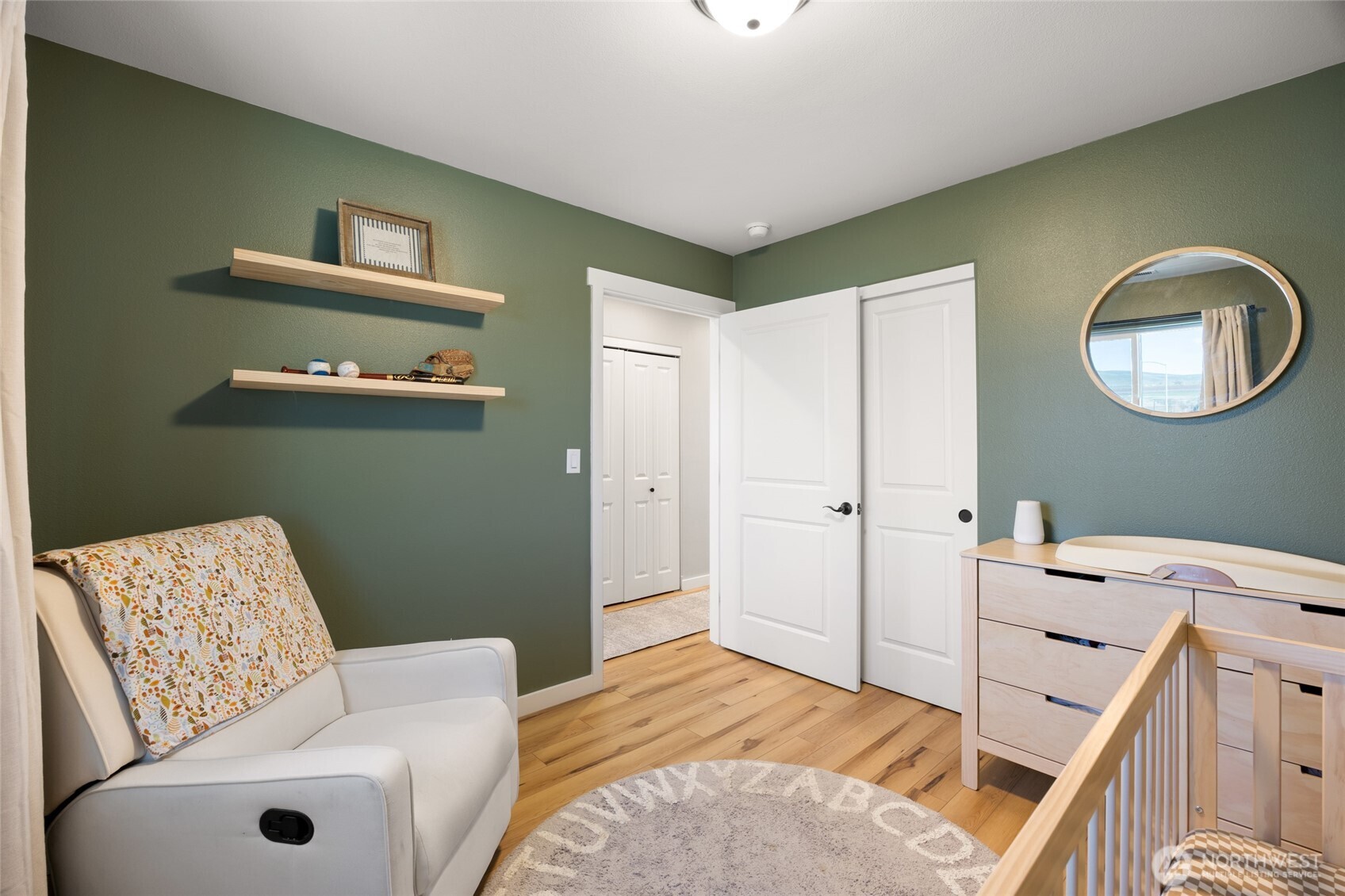 2376 Chelan Street Ephrata, WA 98823 - Photo 23 of 40 a bedroom with a bed and a chair