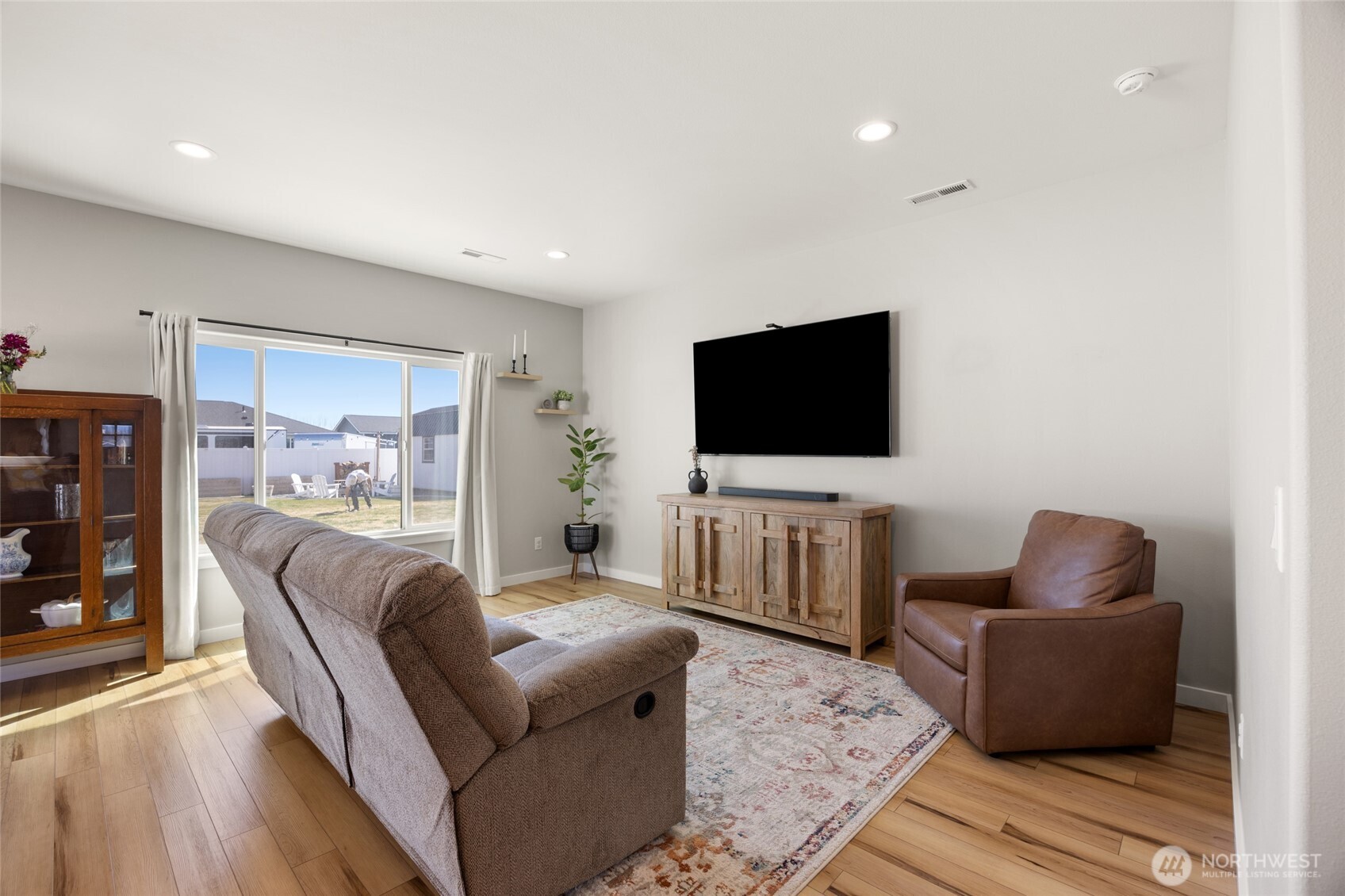 2376 Chelan Street Ephrata, WA 98823 - Photo 7 of 40 a living room with furniture and a flat screen tv