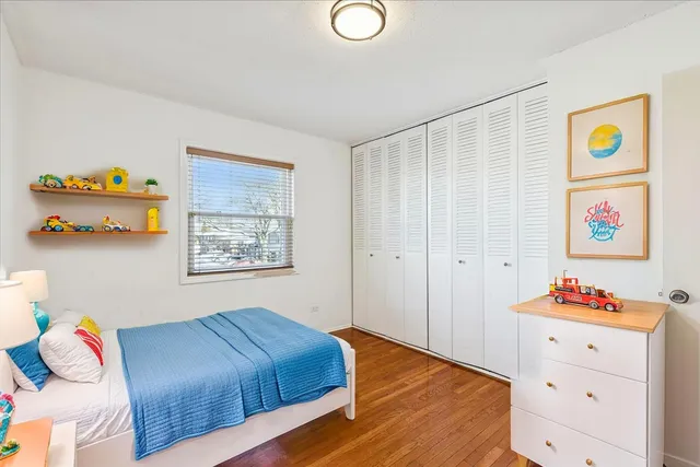 a bedroom with a bed and furniture