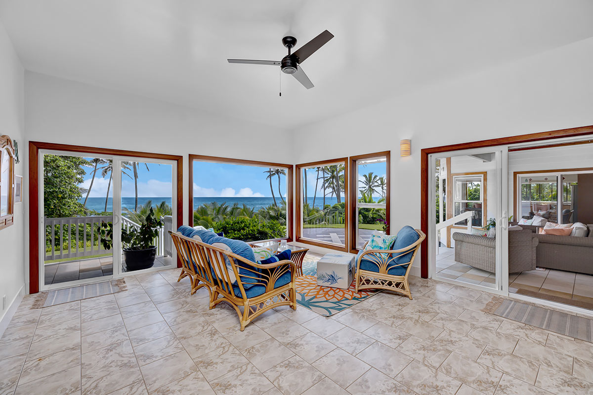 13-5725 Kalapana Kapoho Beach Road Pahoa, HI 96778 - Photo 16 of 25 a living room with furniture floor to ceiling windows and a floor to ceiling window