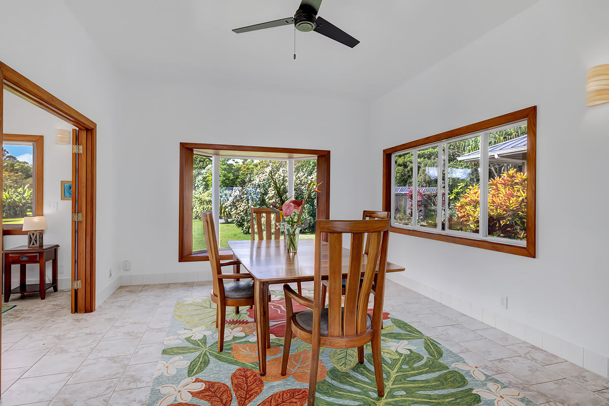 13-5725 Kalapana Kapoho Beach Road Pahoa, HI 96778 - Photo 19 of 25 a view of a dining room with furniture window and outside view
