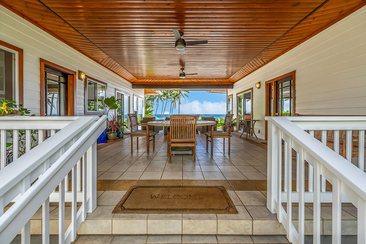 13-5725 Kalapana Kapoho Beach Road Pahoa, HI 96778 - Photo 4 of 25 a view of a patio with table and chairs