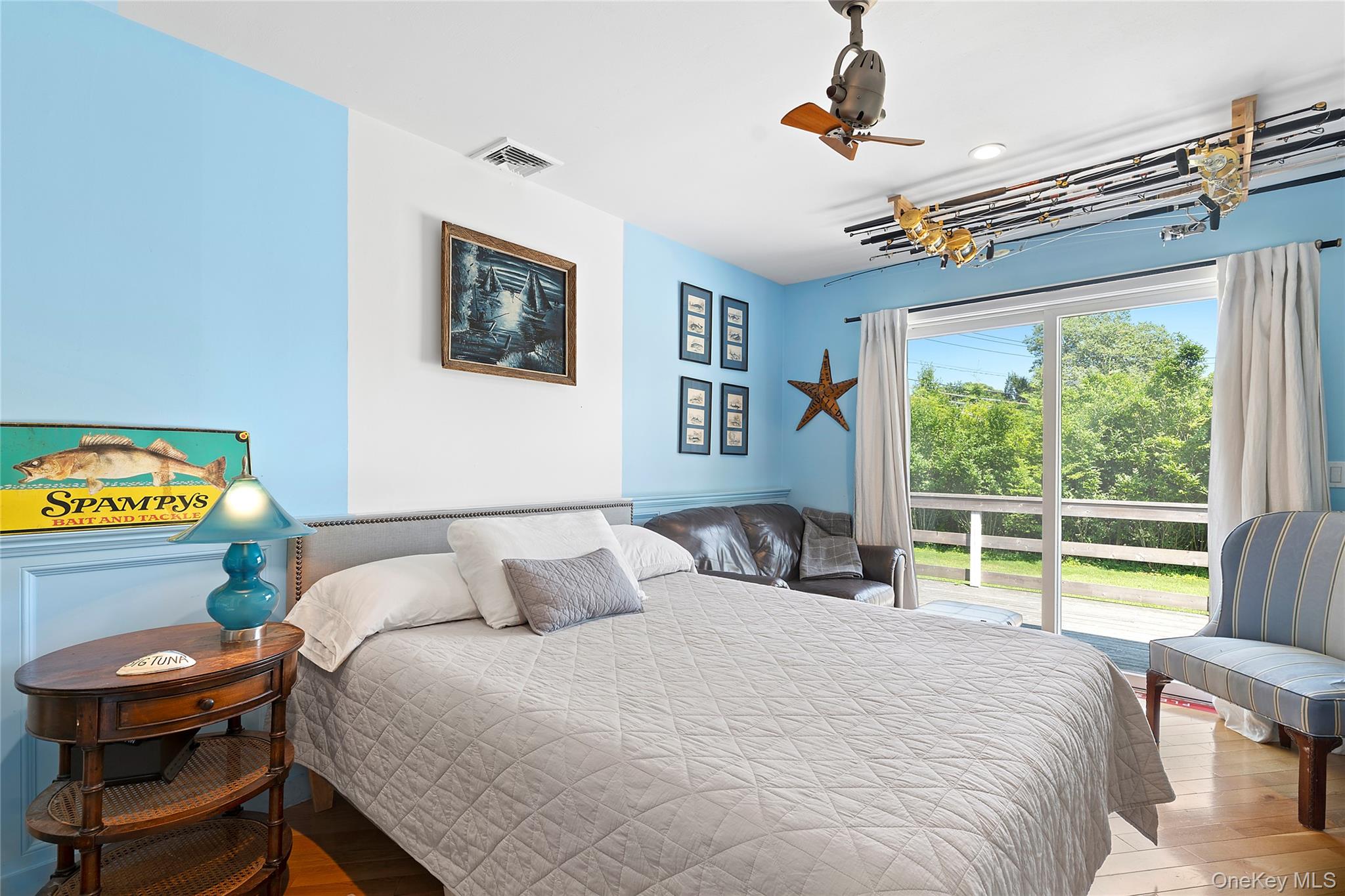 38 Liberty Street Westhampton Beach, NY 11978 - Photo 13 of 23 Bedroom with wood finished floors and ceiling fan