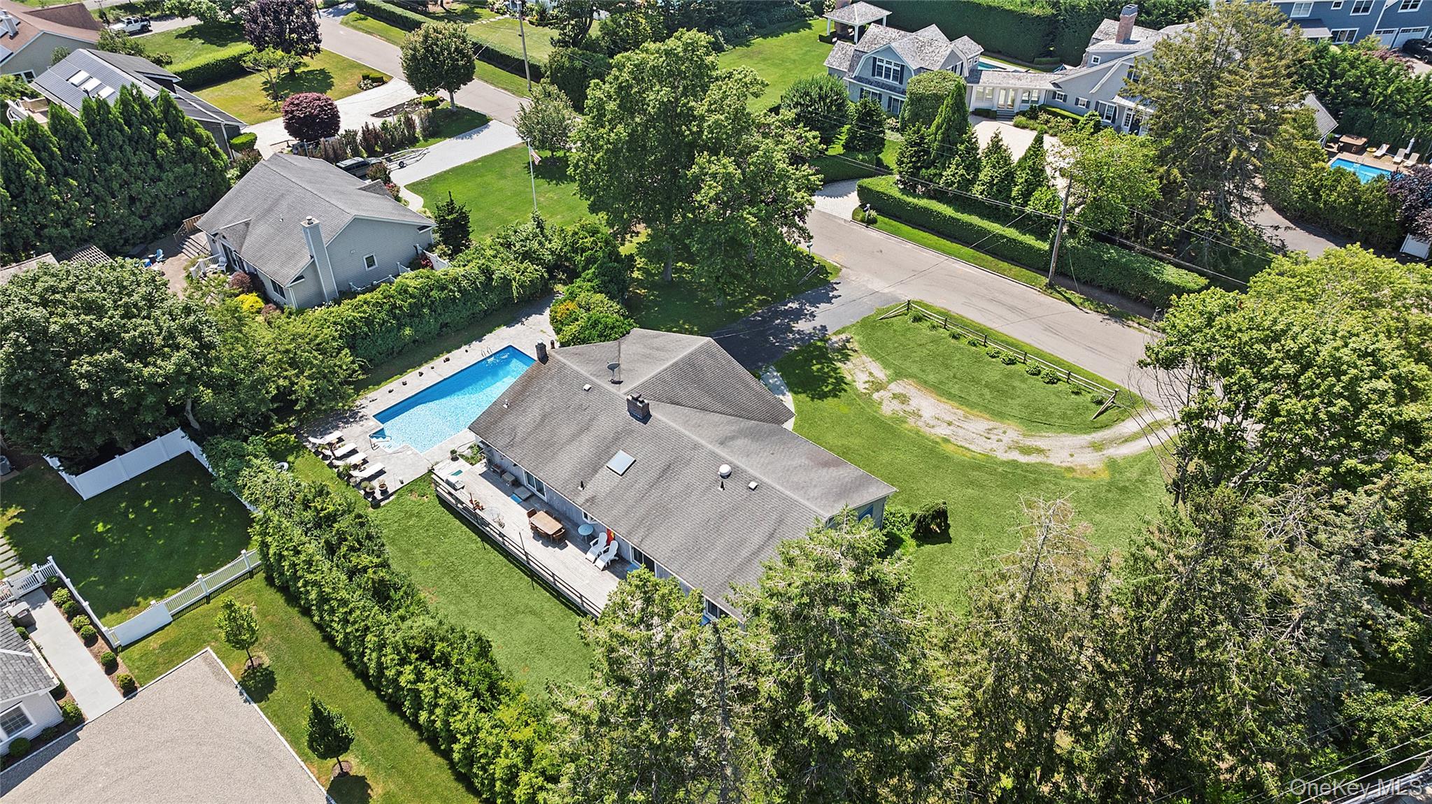 38 Liberty Street Westhampton Beach, NY 11978 - Photo 20 of 23 Aerial view of residential area with a pool