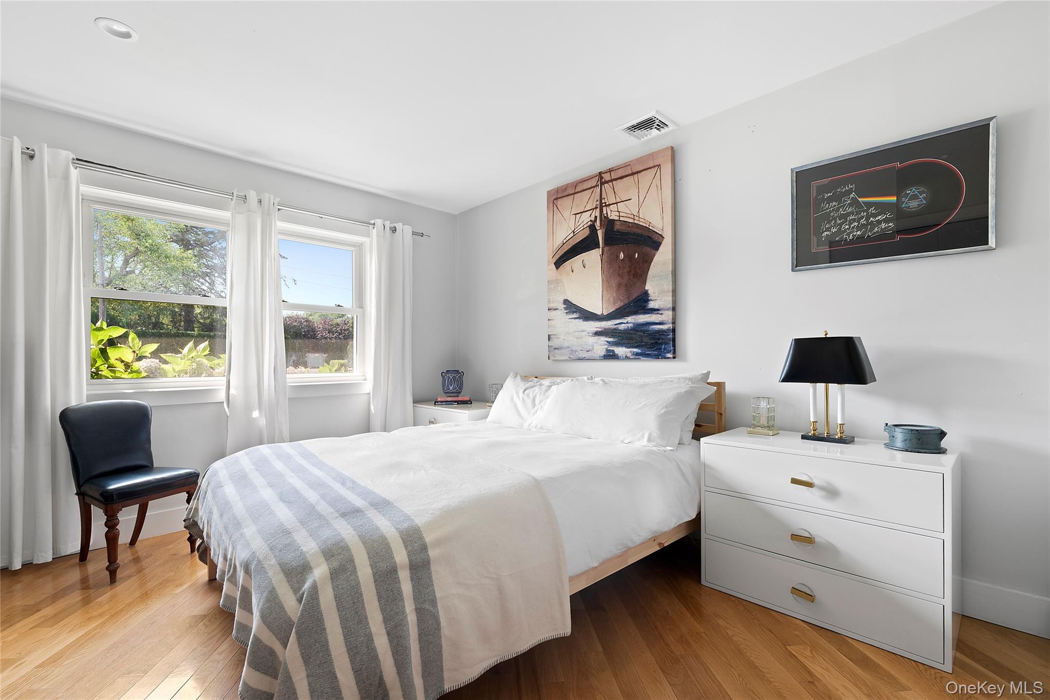 38 Liberty Street Westhampton Beach, NY 11978 - Photo 9 of 23 Bedroom featuring wood finished floors