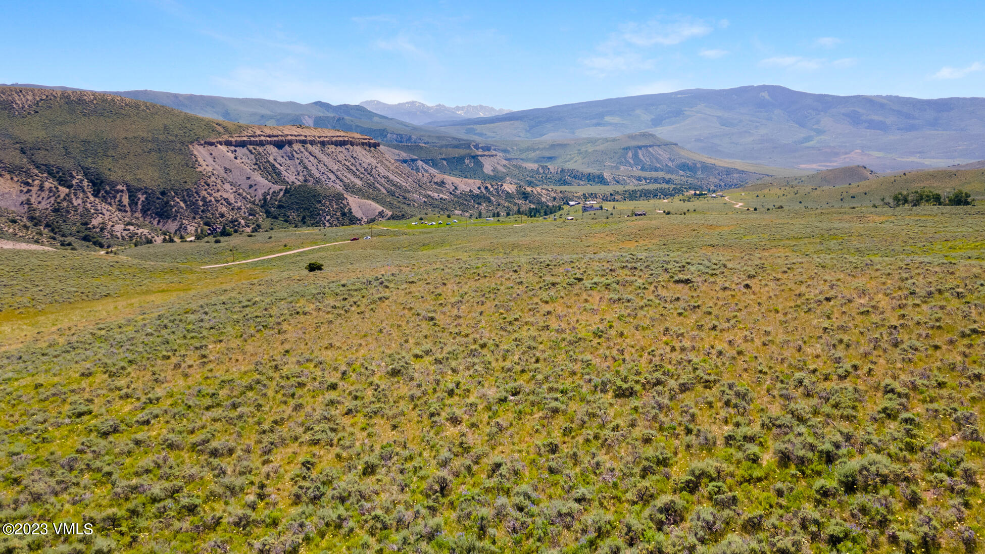 Tbd Alkali Creek Road, Unit HM 8 Wolcott, CO 81655 - Photo 1 of 14 a view of an ocean with mountains in the background